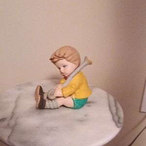Charming Boy Figurine in Yellow and Green
